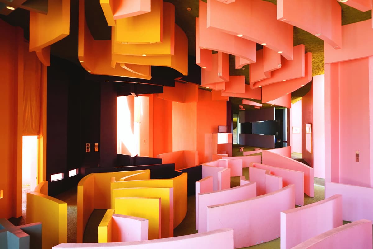 Vibrant geometric structures and rolling grassy terrain designed by Shusaku Arakawa and Madeline Gins