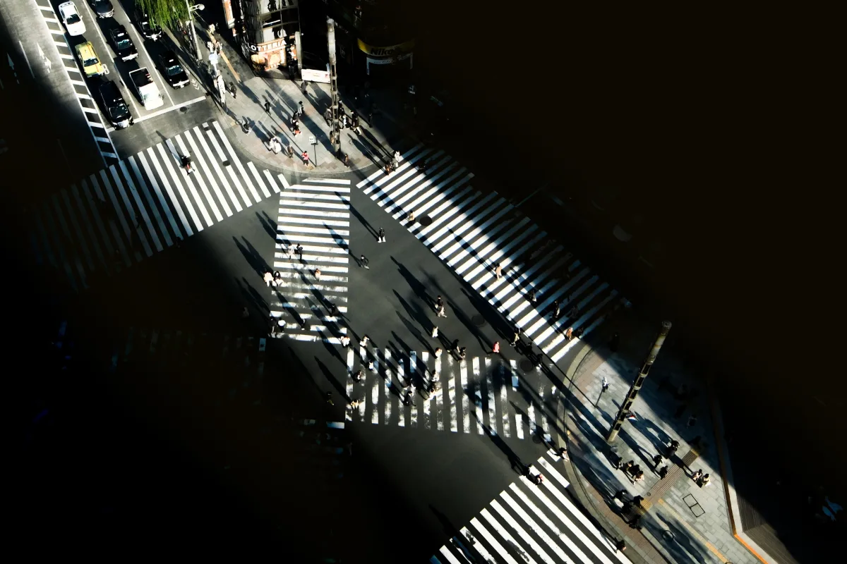Long shadows cast on a crossing in Ginza