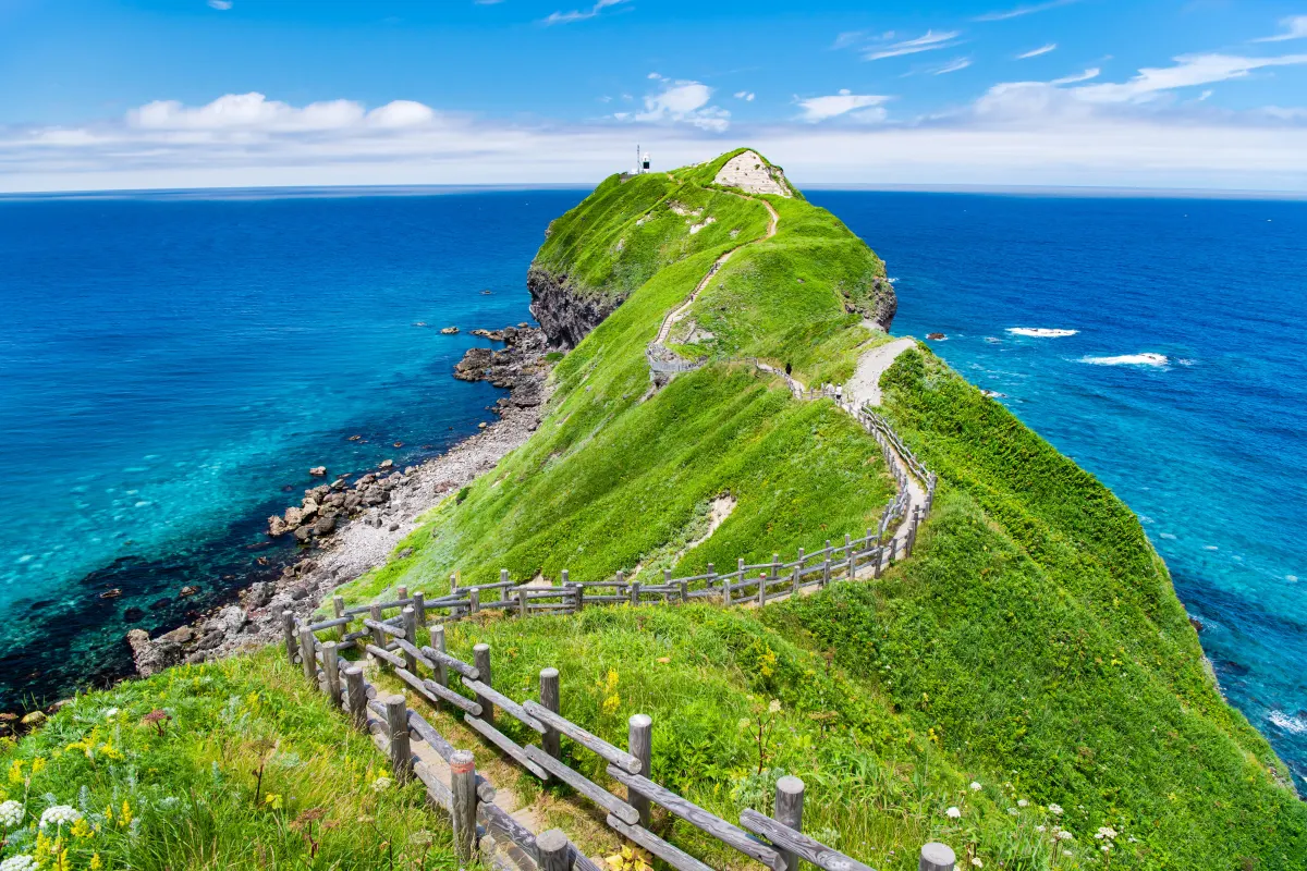 Coastal cliffs and blue sea at Cape Kamui in Hokkaido