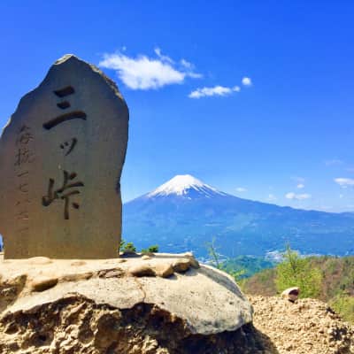 Mount Mitsutoge hiking trail with forests, rocky paths, and Mount Fuji views.