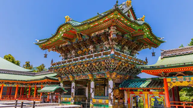Ornate Buddhist temple architecture with intricate carvings and vibrant traditional details.