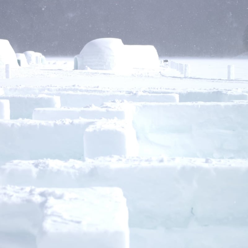 Snow and ice village built on a frozen lake in Hokkaido during winter.