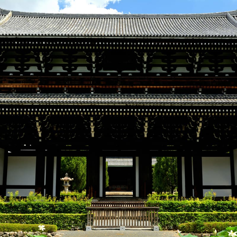Scenic views of Tofuku-ji Temple featuring historic architecture and seasonal maple trees.