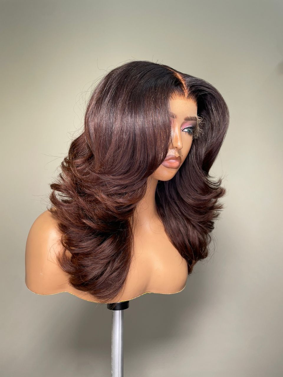 A premium straight HD lace wig crafted from high-quality virgin hair. Offers a seamless blend with your natural hairline and a silky-smooth texture for a flawless look