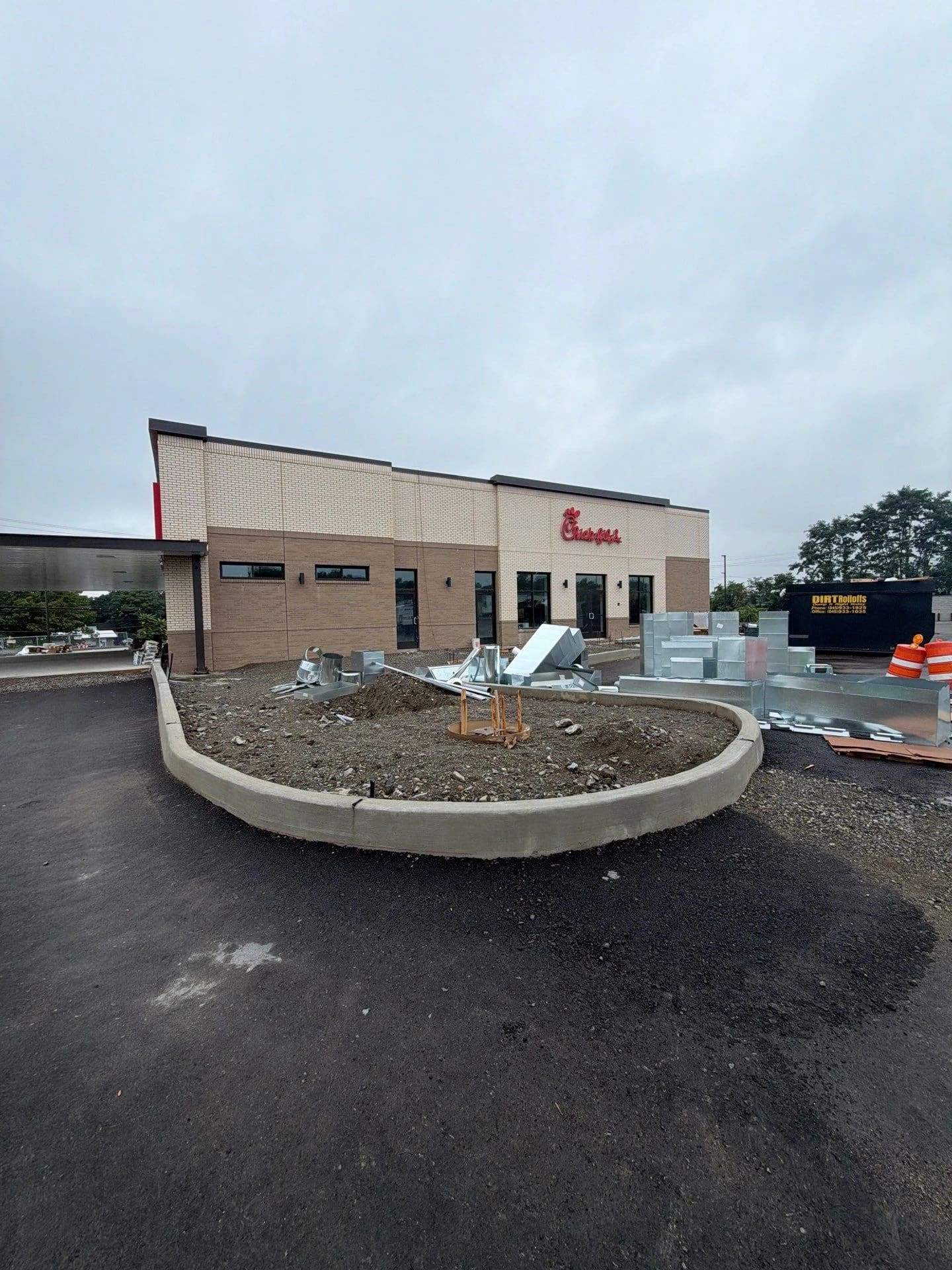 Chick-fil-A restaurant exterior during construction in Kingston