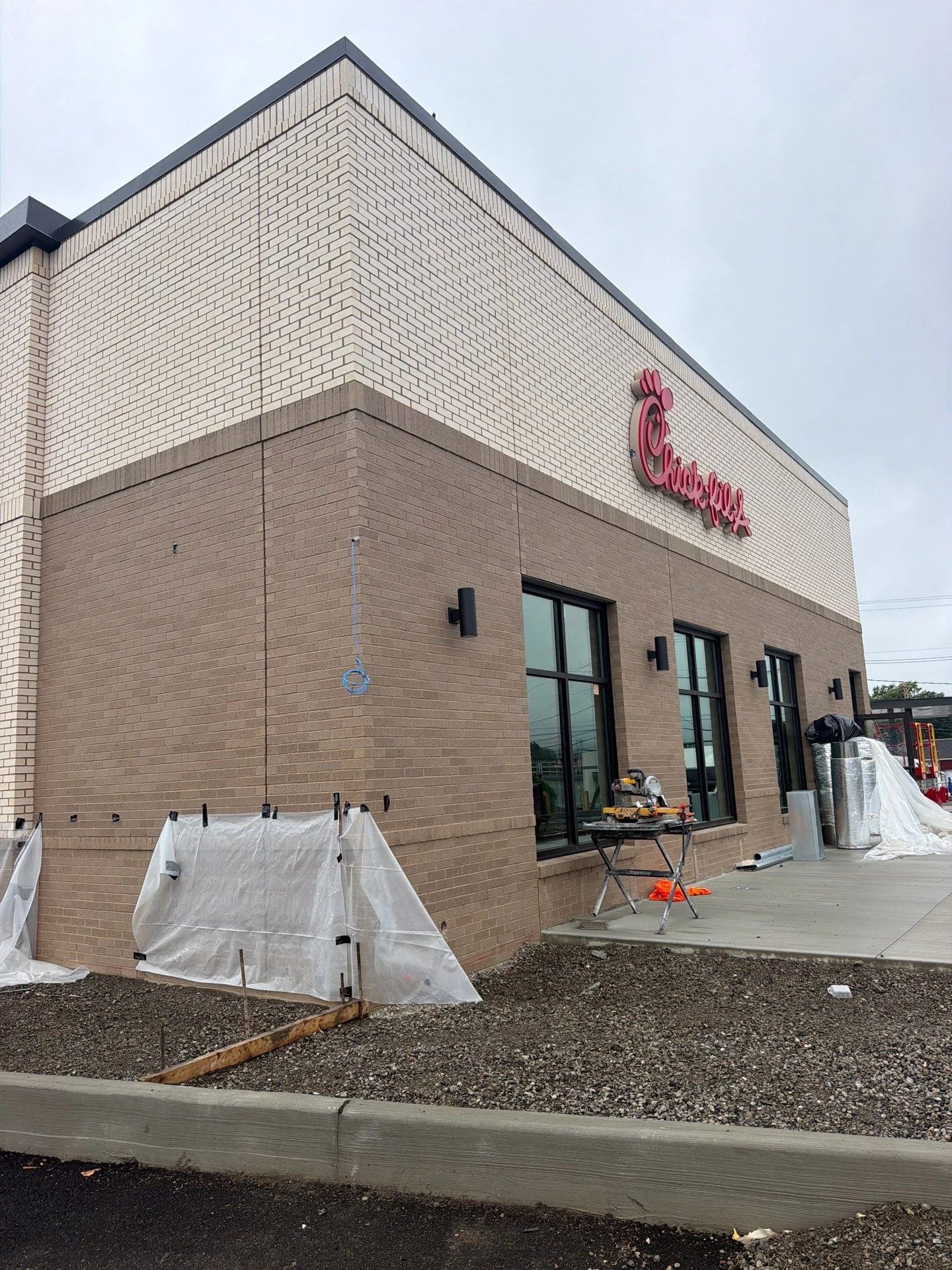 Side exterior of the Kingston restaurant during construction
