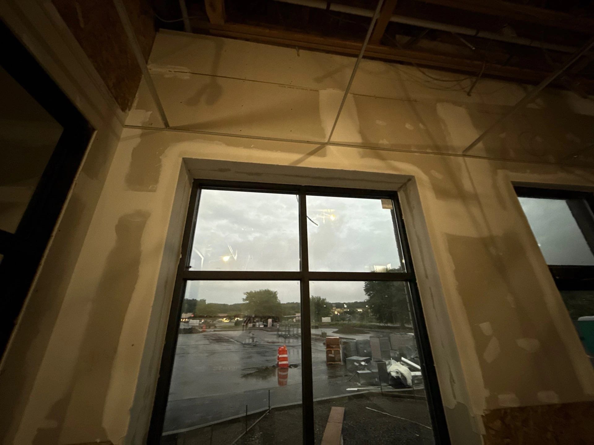 Unfinished window wall during the Kingston restaurant construction
