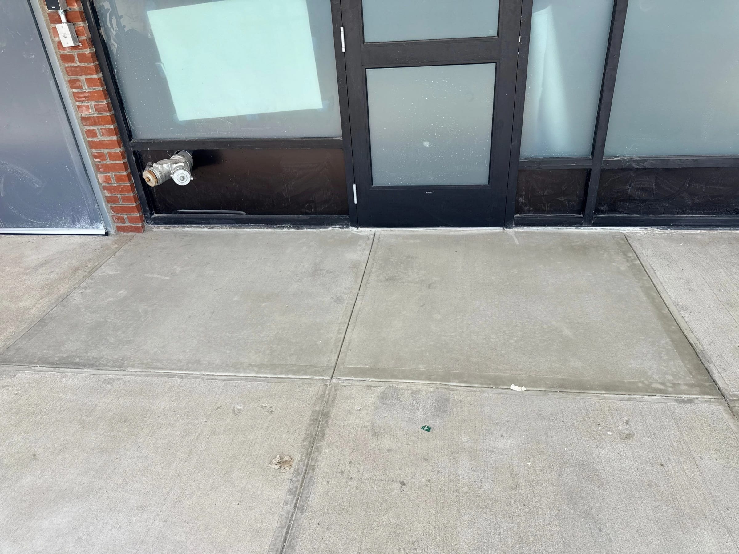 Pavement at the entrance to Lidl Staten Island