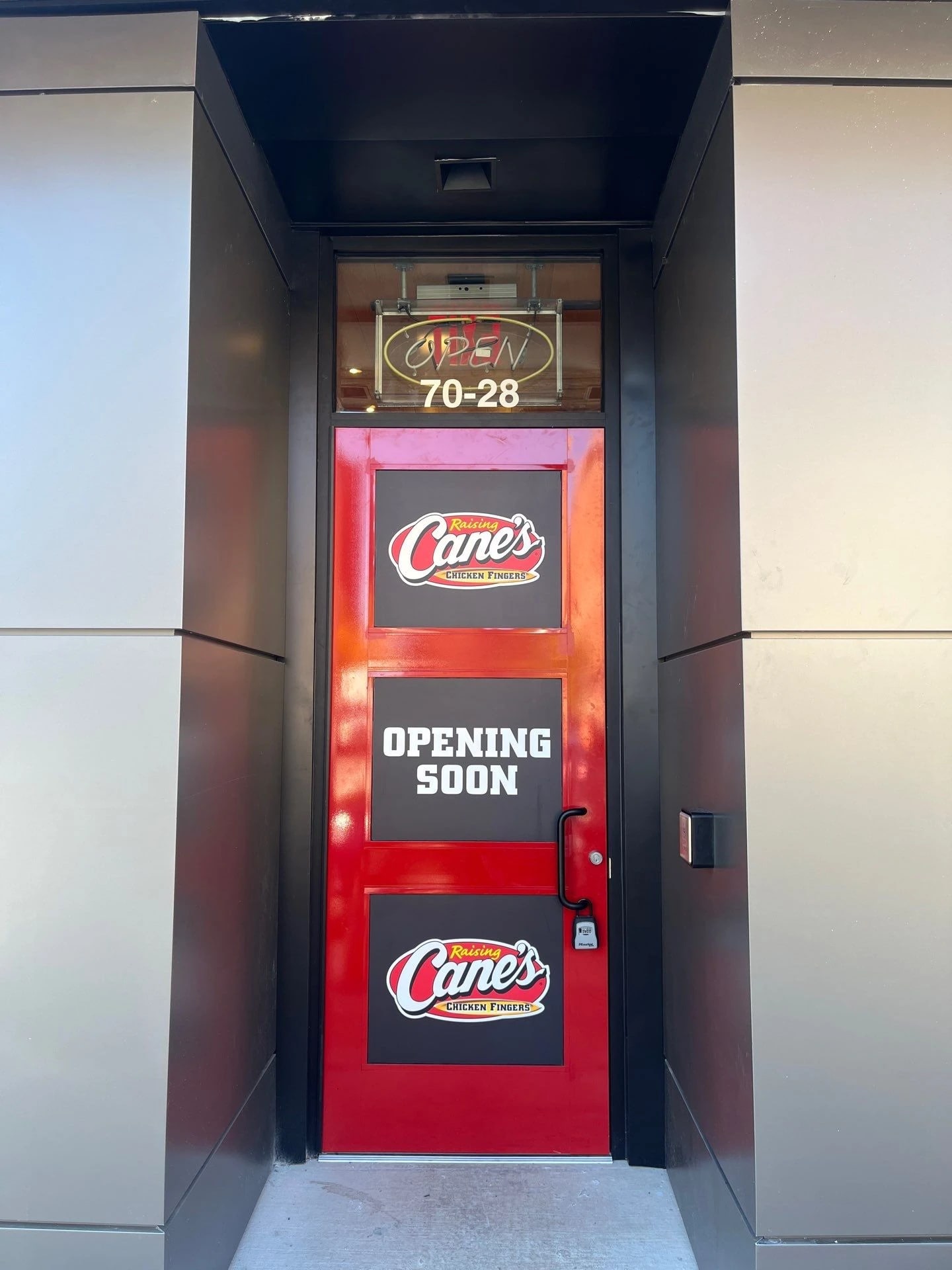 Restaurant entry door and storefront finish detail