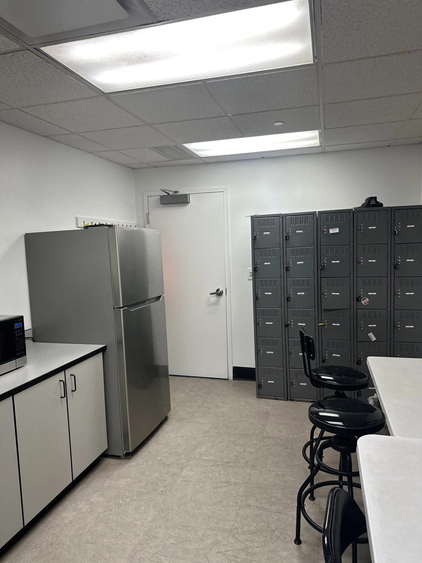 Staff room walls and lockers after interior painting