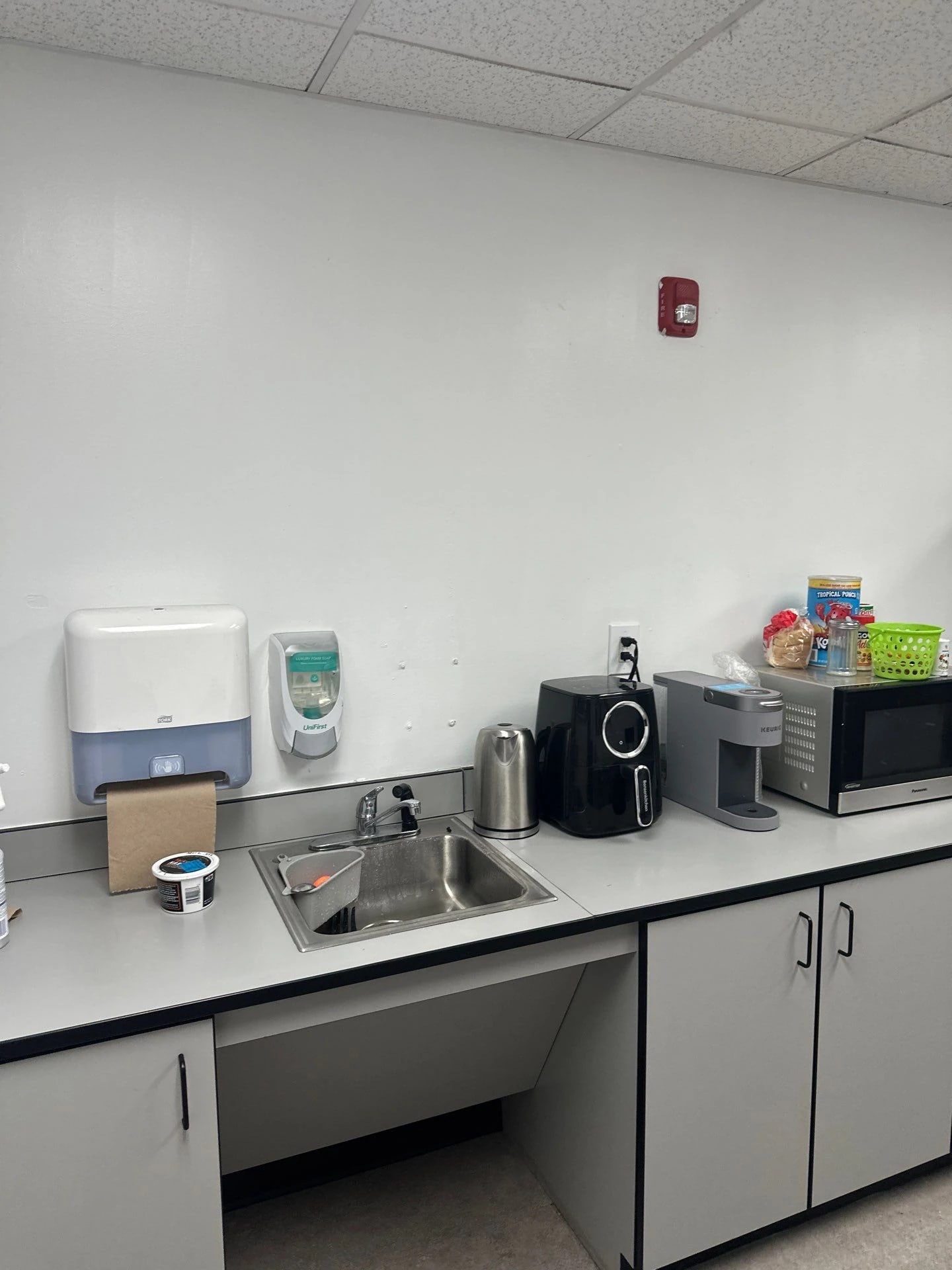 Refreshed kitchenette wall in the retail staff area