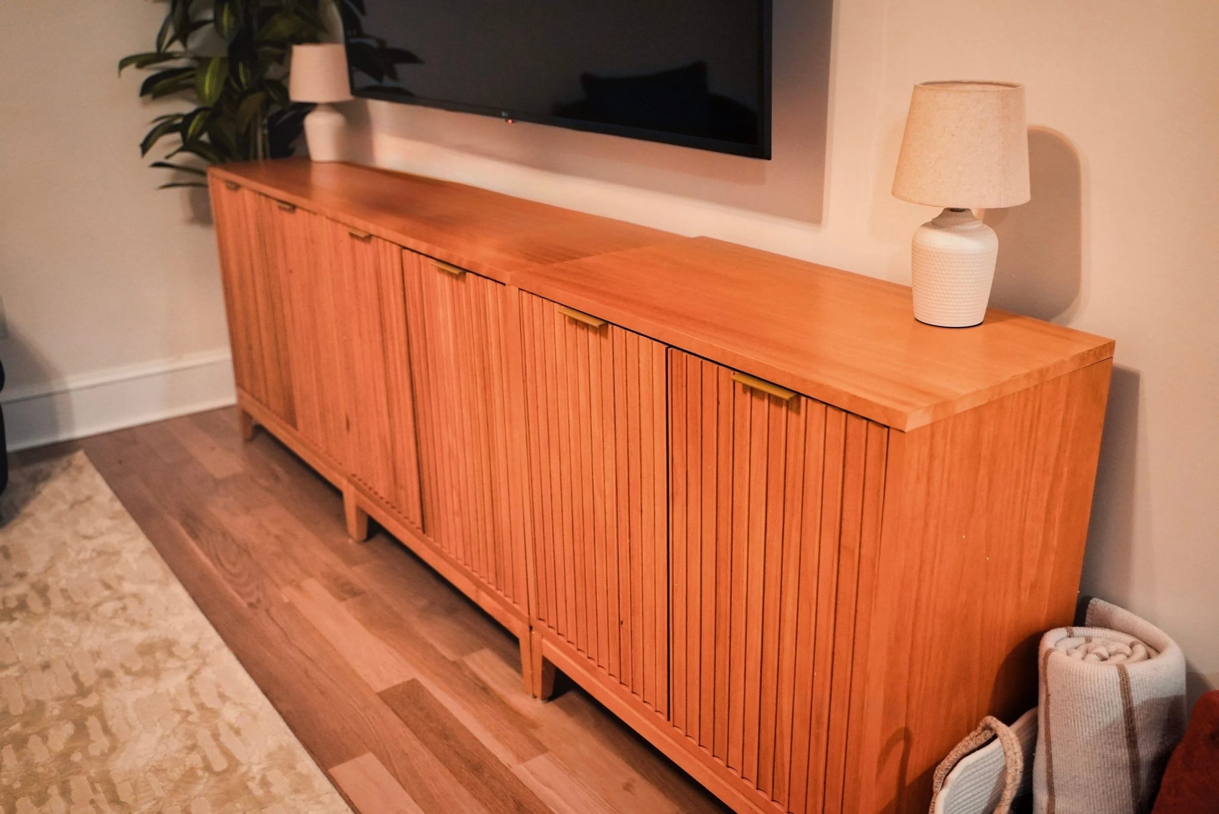 Custom living-room cabinetry in the renovated apartment