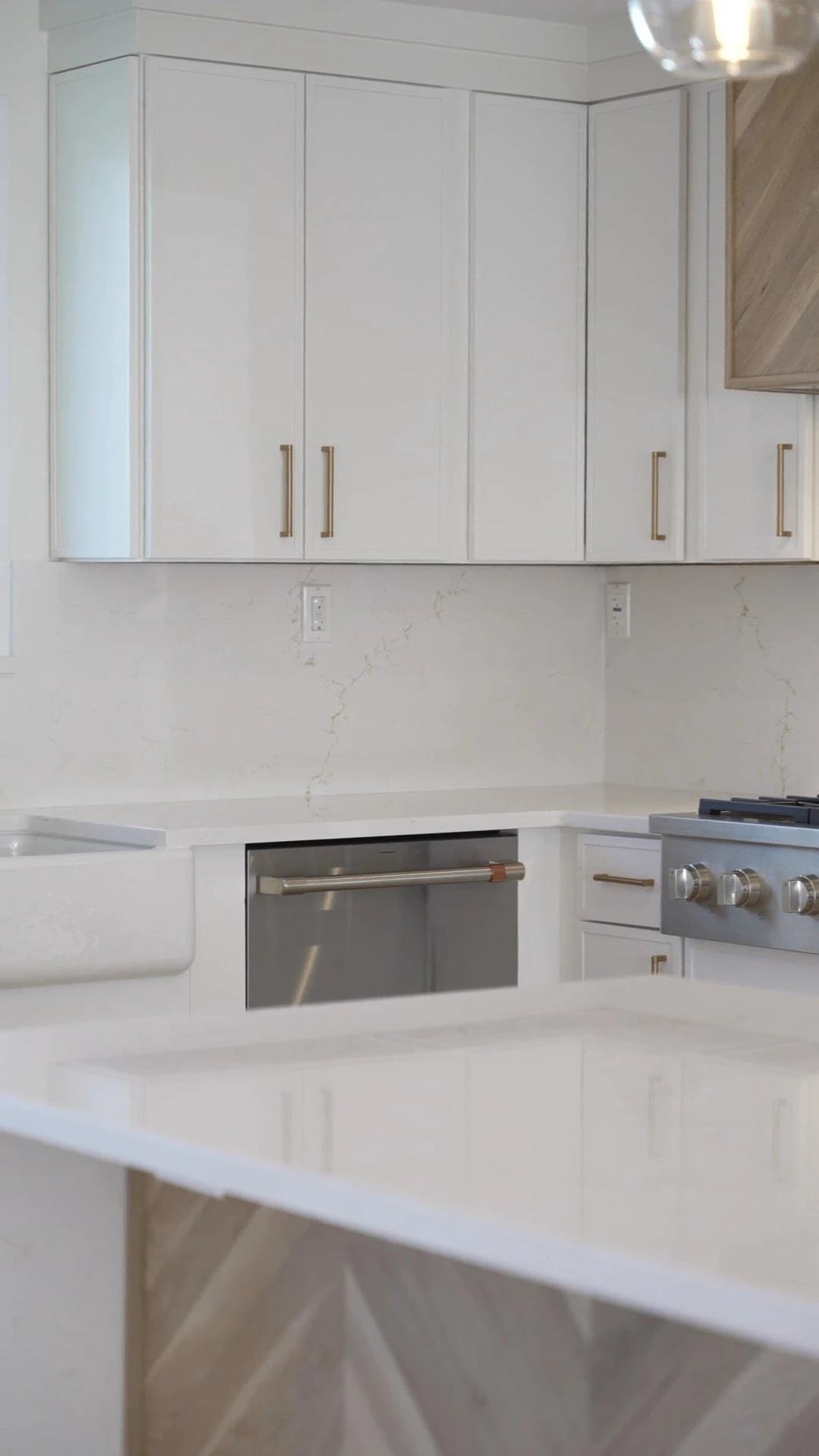 Custom cabinetry and island in the open-plan kitchen