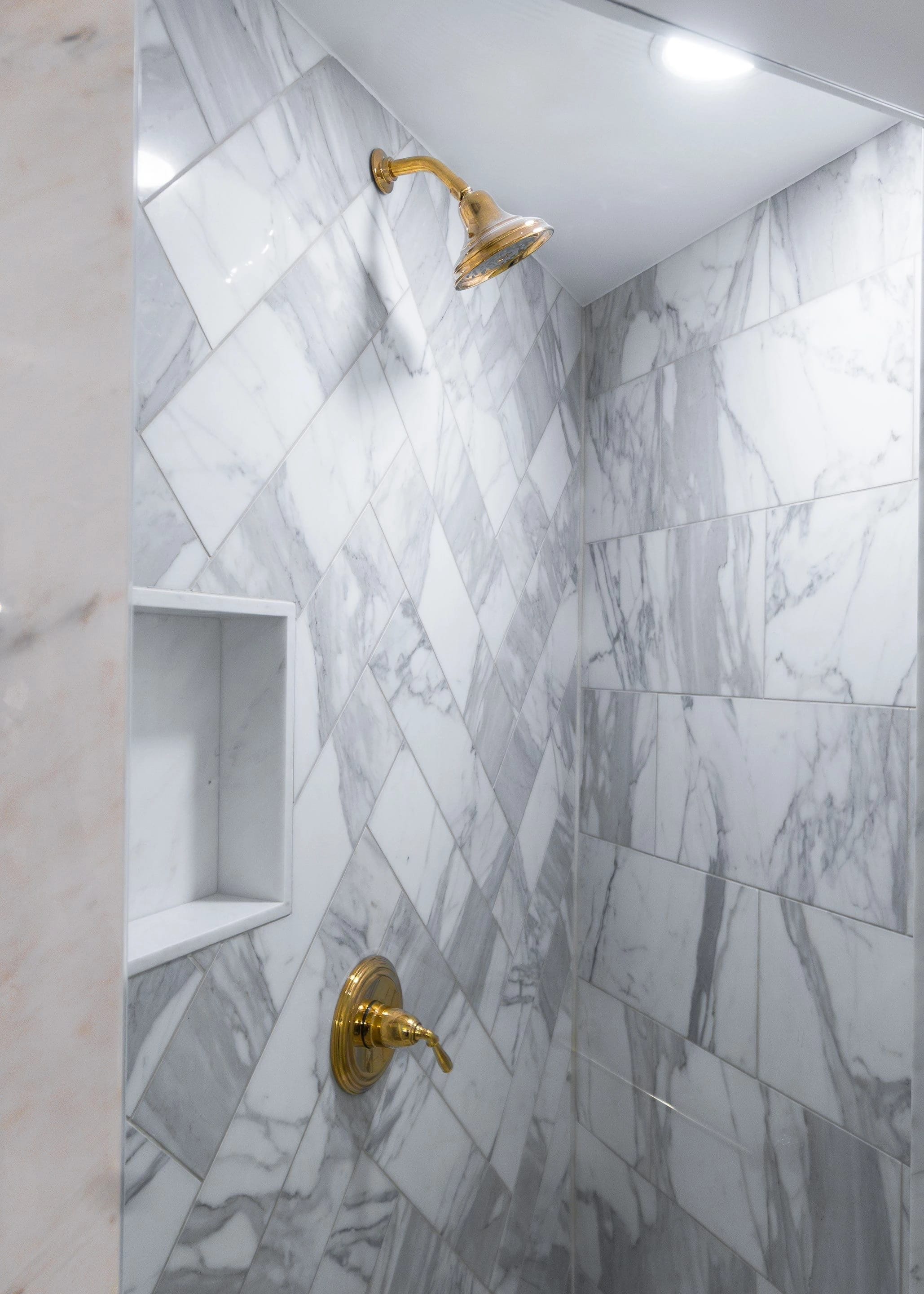 Marble tile shower in the Tribeca apartment