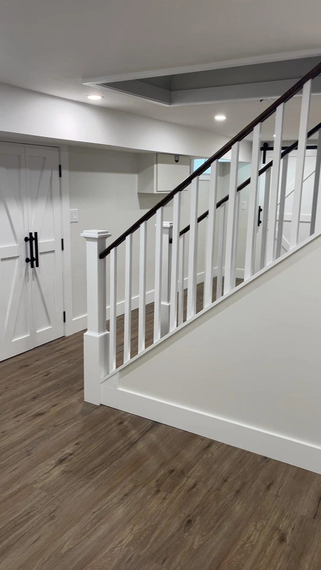 Stair rail in the renovated Hicksville basement