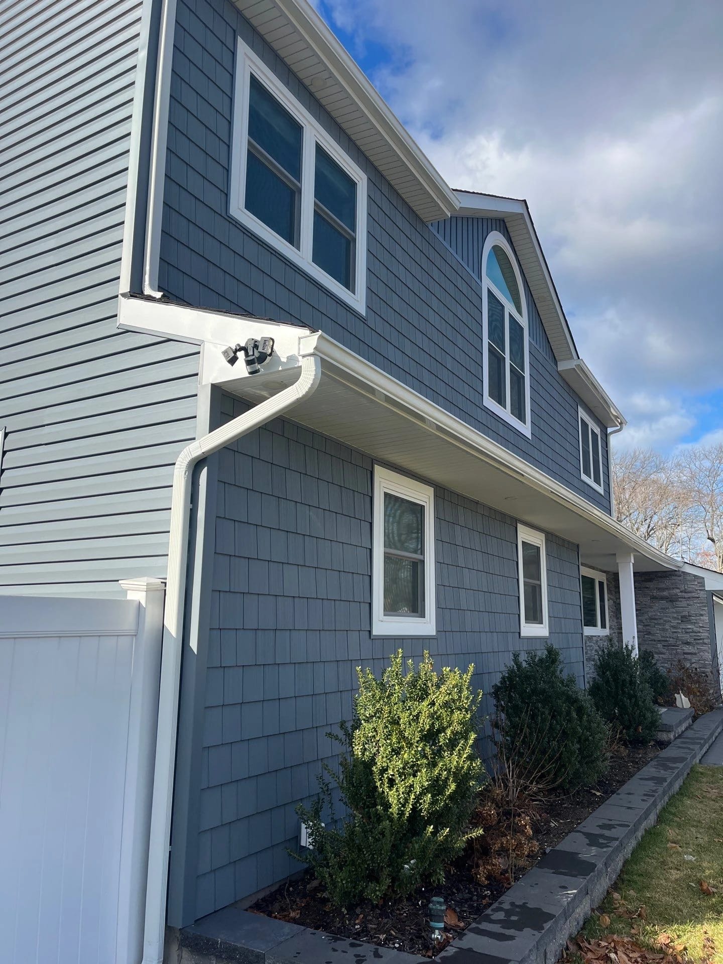 New siding and windows along the side of the home