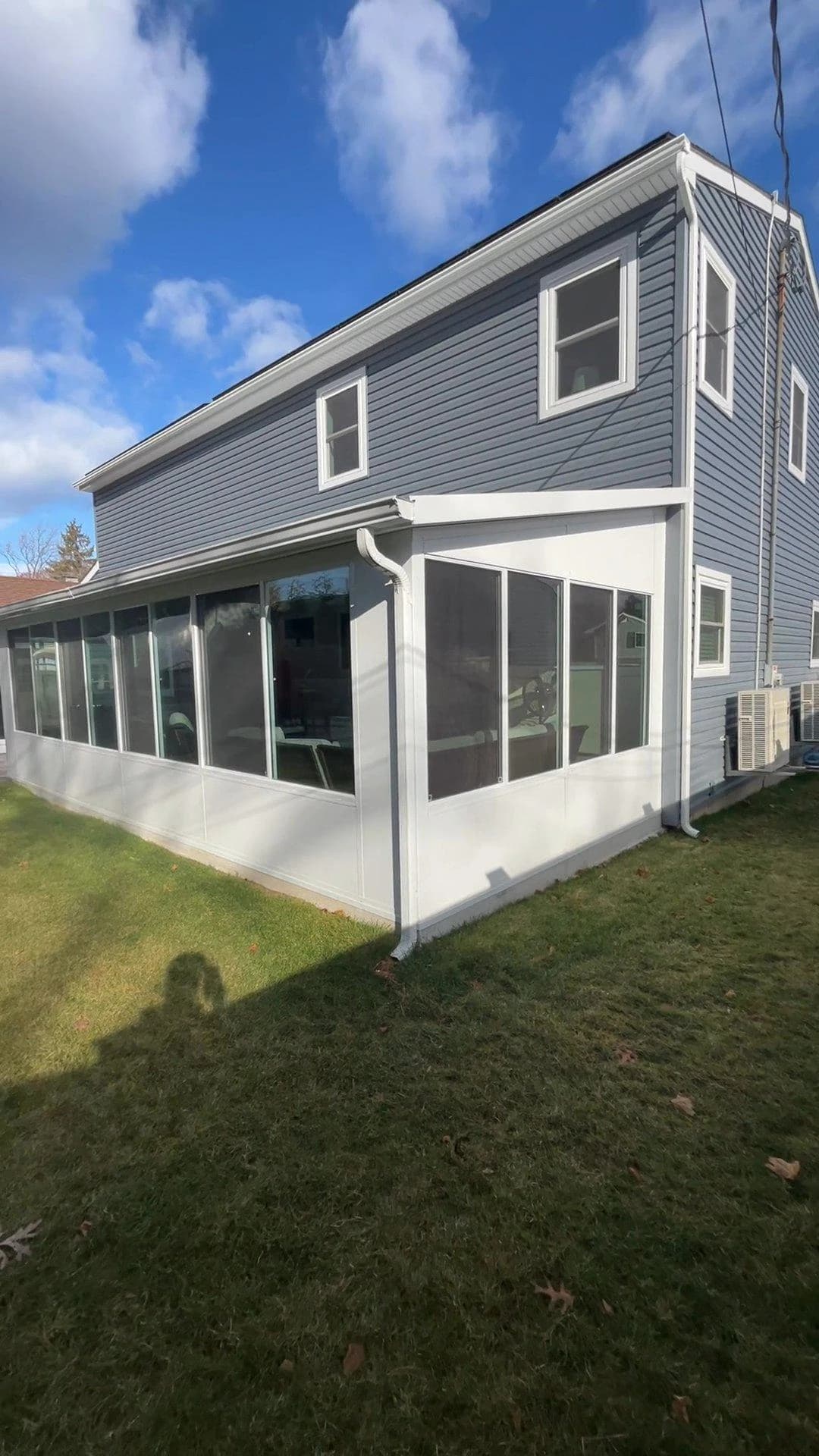 Side and rear facade of the renovated Kings Park home