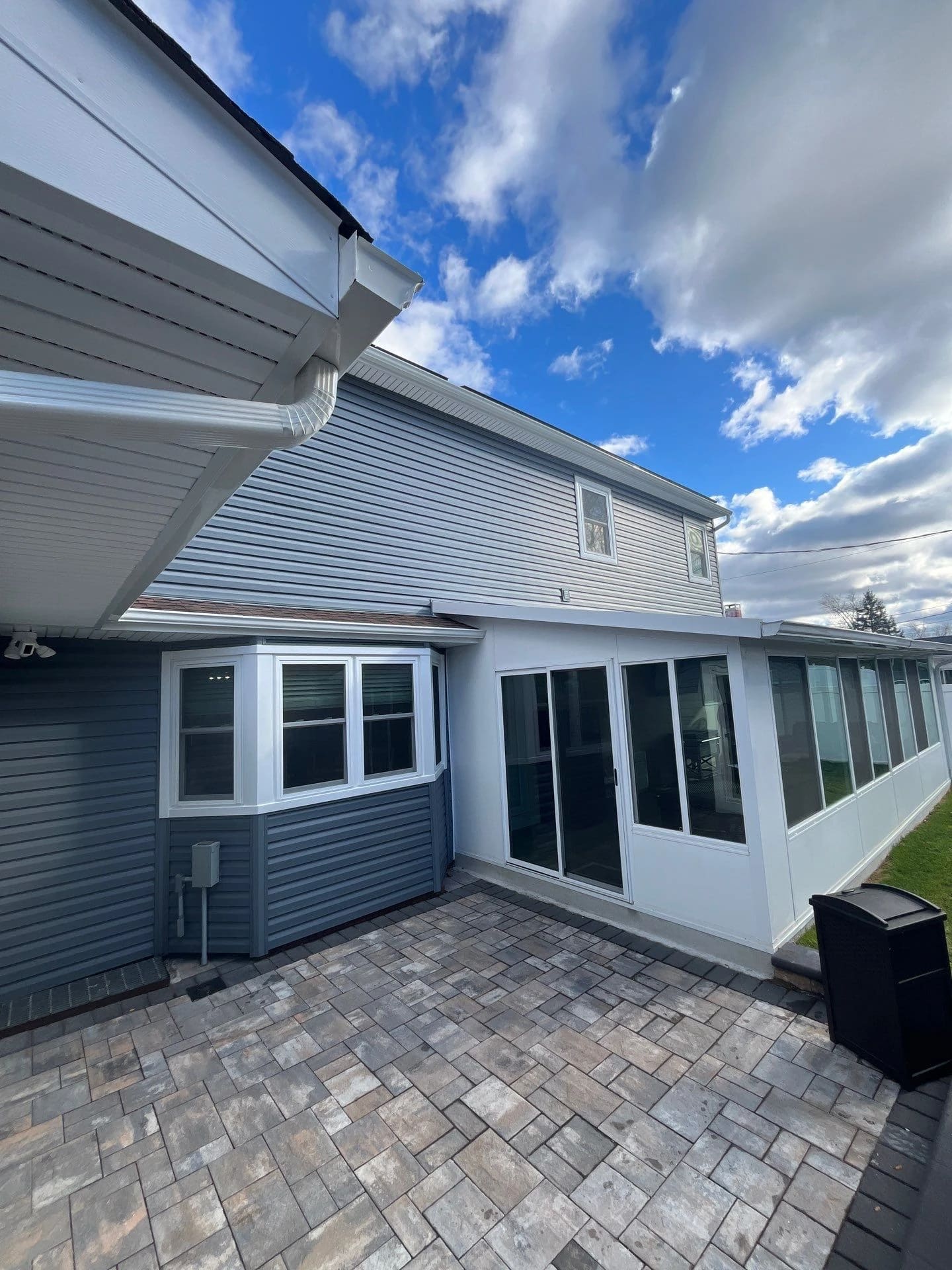 New rear siding on the Kings Park home