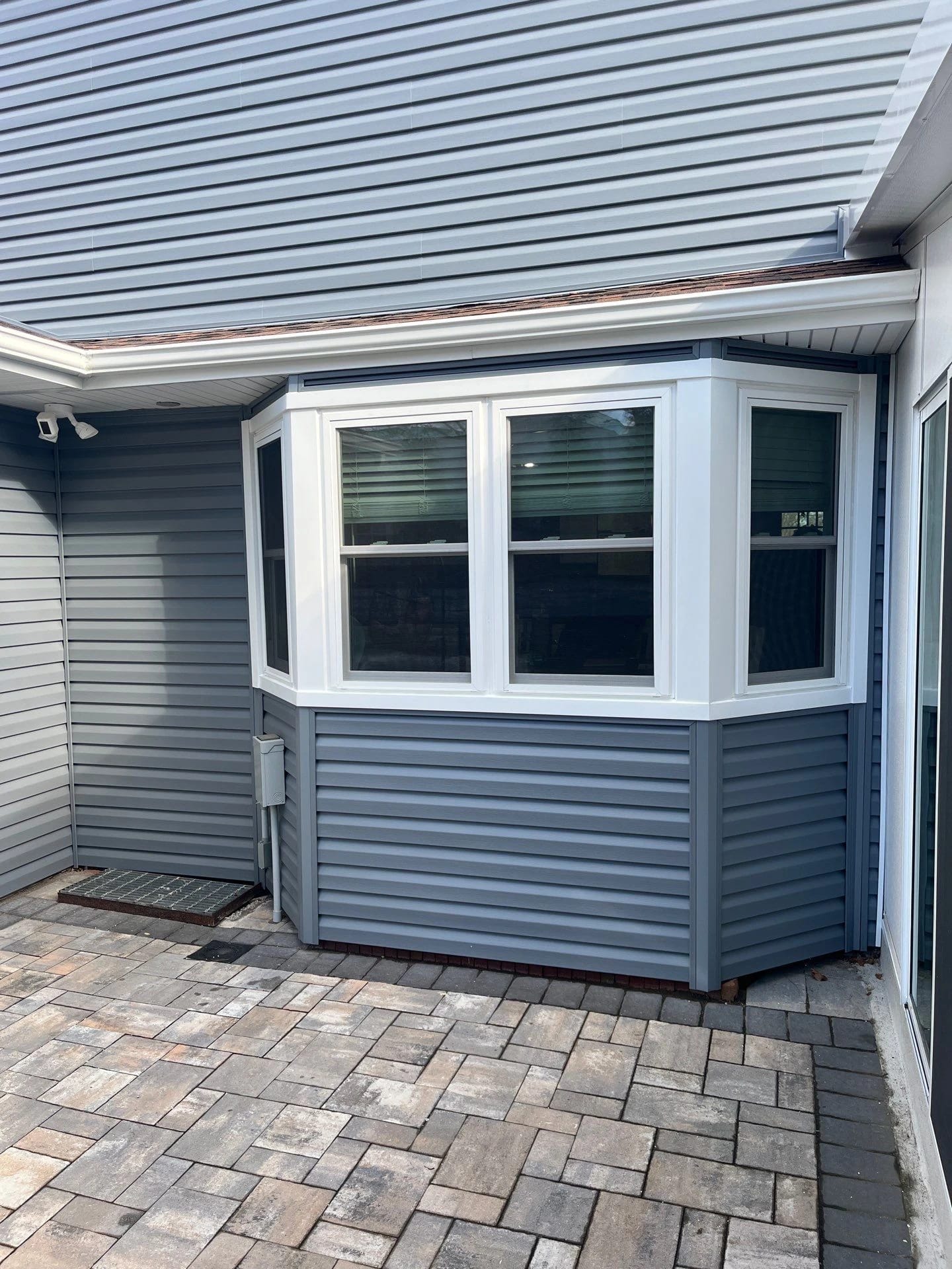 Bay window detail at the completed exterior renovation