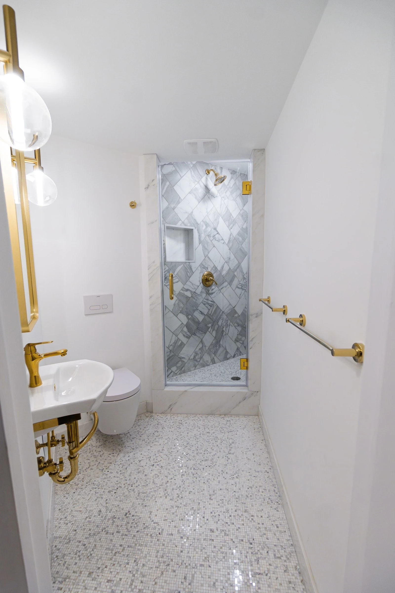 Second Bathroom Walk in Marble Shower. Custom marble mosaic floor and full marble base and trim surrounds.
