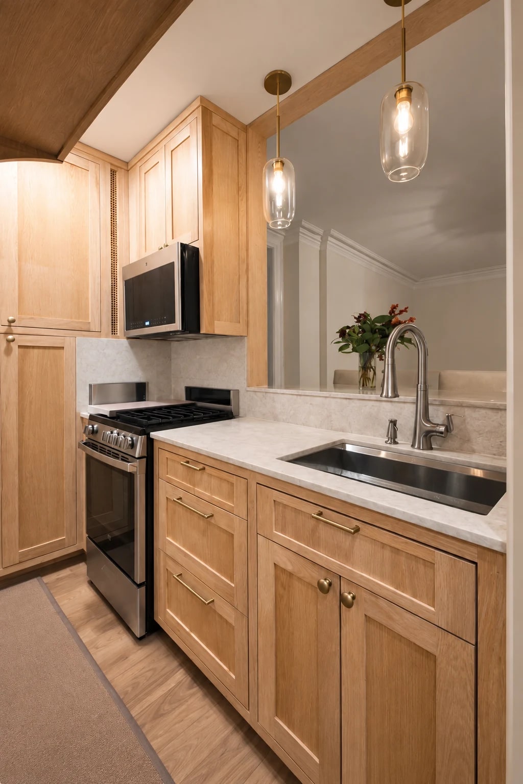 Custom rough sawn white oak cabinetry with quartzite countertops and backsplash