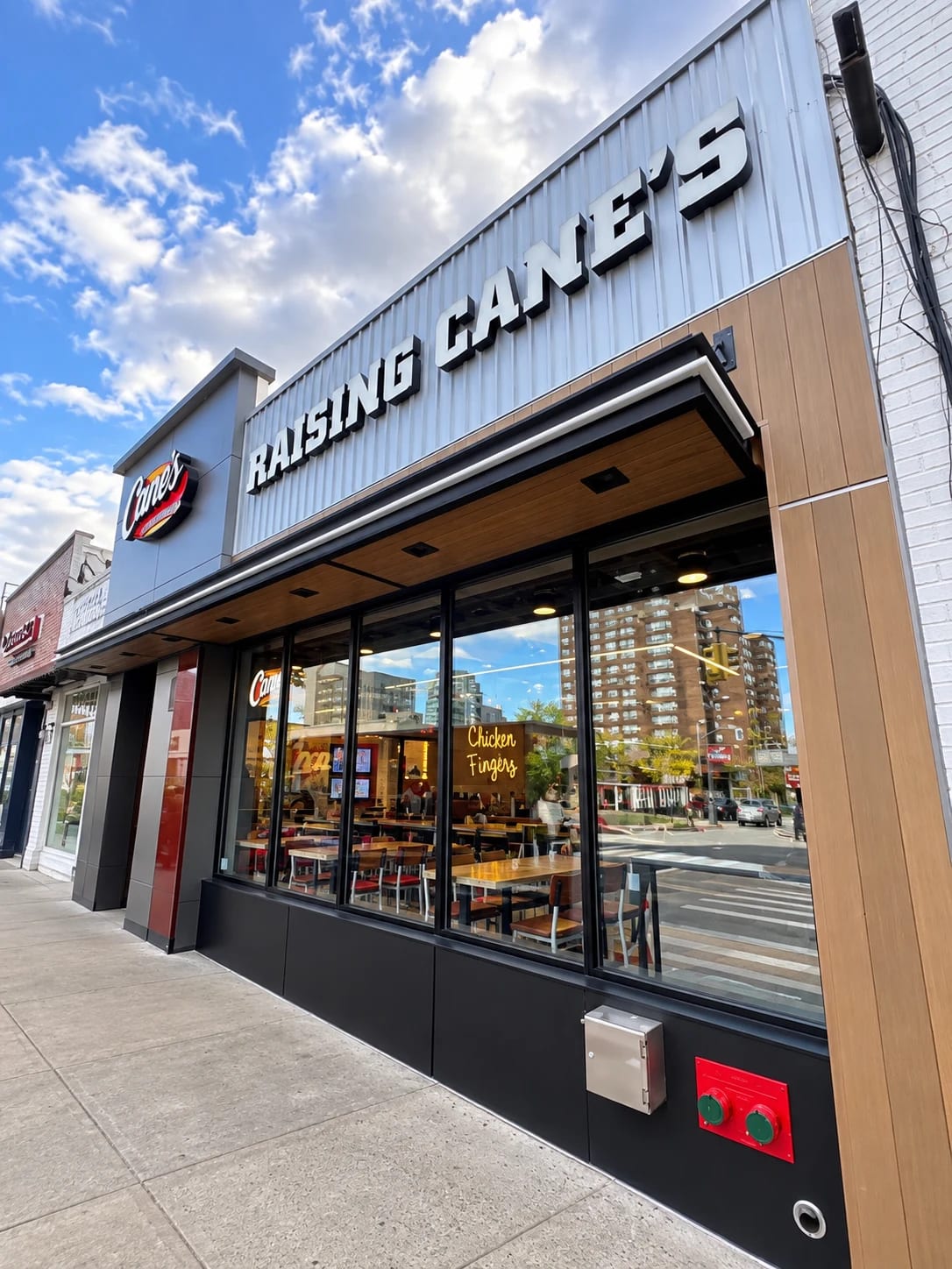Completed Raising Cane’s storefront in Forest Hills