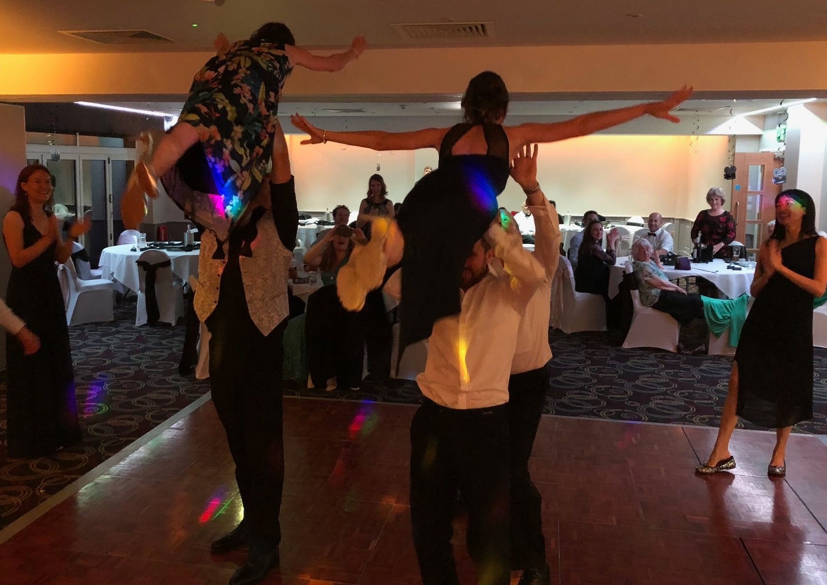 photo of wedding guests copying a dirty dancing move