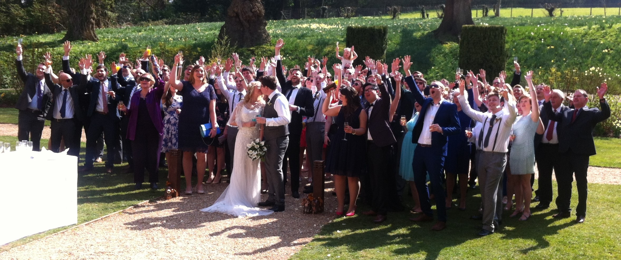 a group of people enjoying a wedding