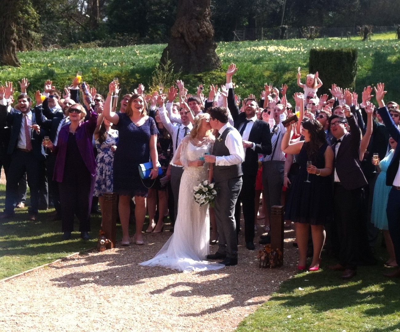 a group of people enjoying a wedding