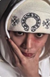 TAG's Suit A Photocard