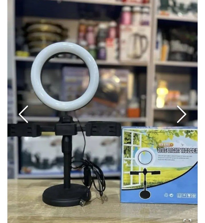 Dual phone holder and telescopic fan — photo 1