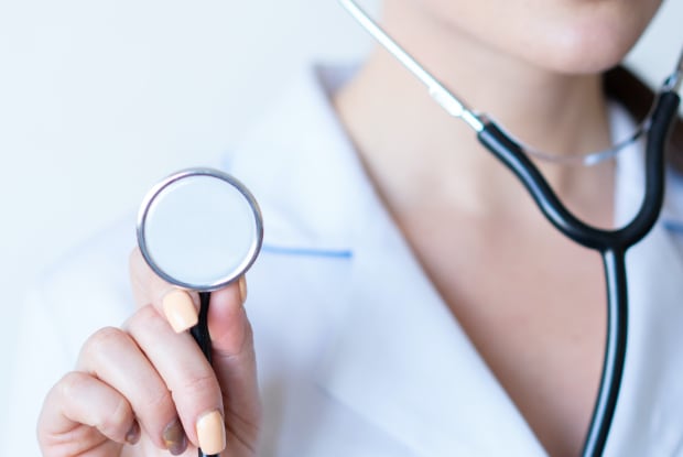 a doctor holding a stethoscope