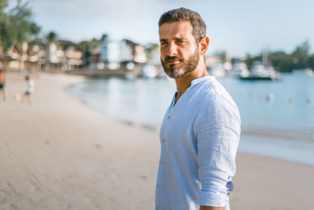 a man standing on a beach