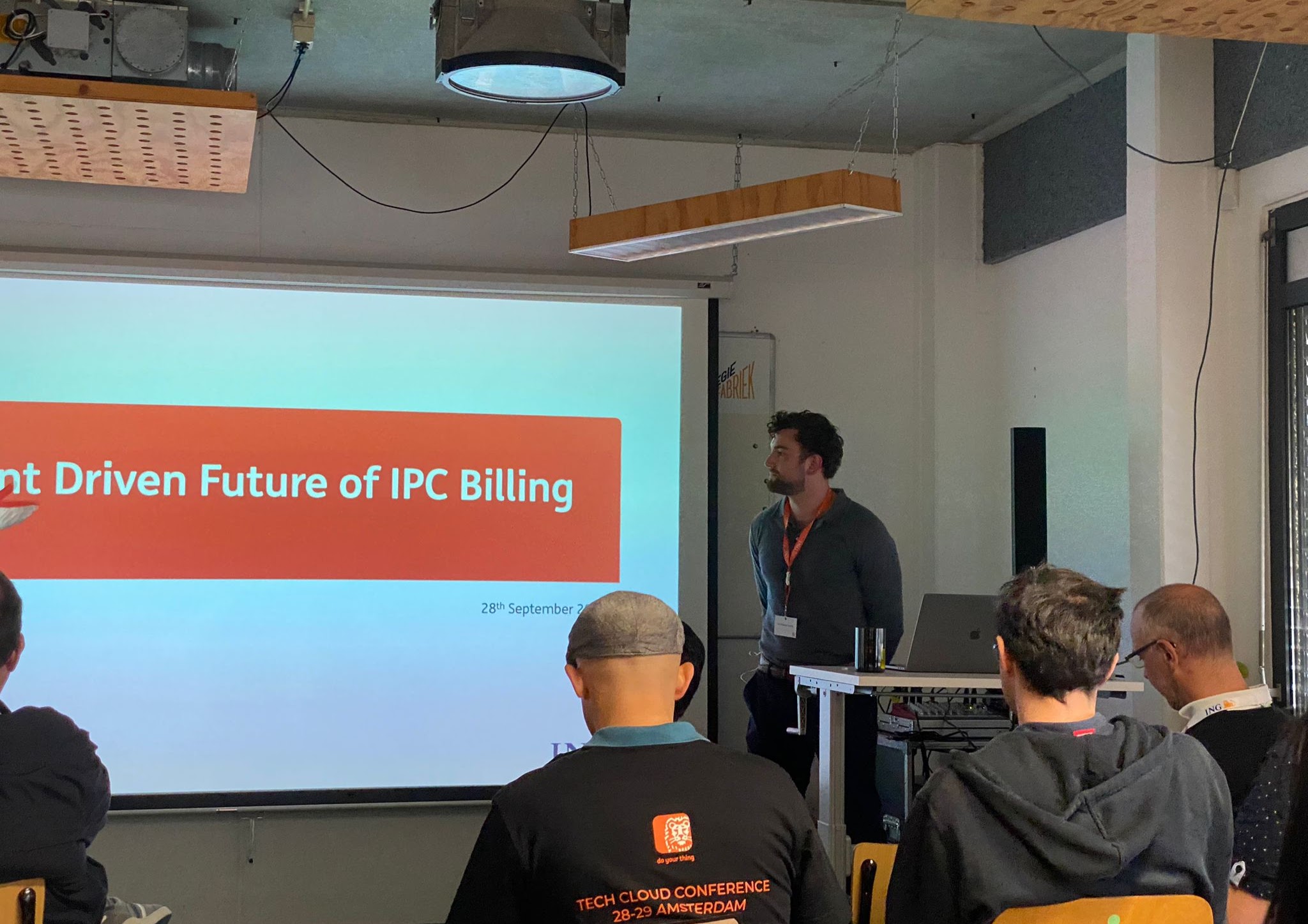 Liam presenting technical work to an audience