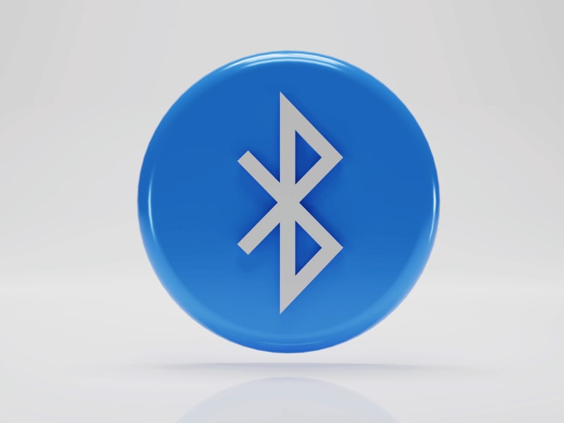 Blue circular icon featuring the official Bluetooth symbol