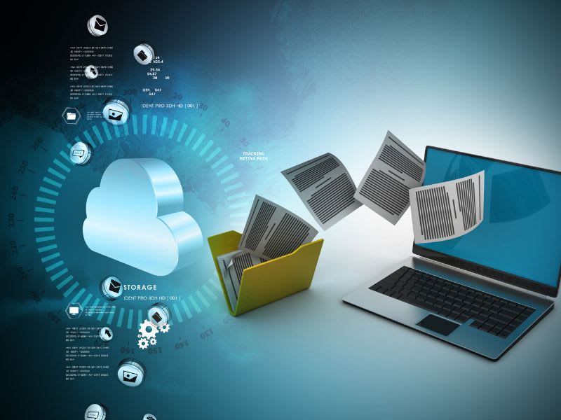 Illustration showing files transferring from a laptop to a folder and cloud icon, representing backup methods