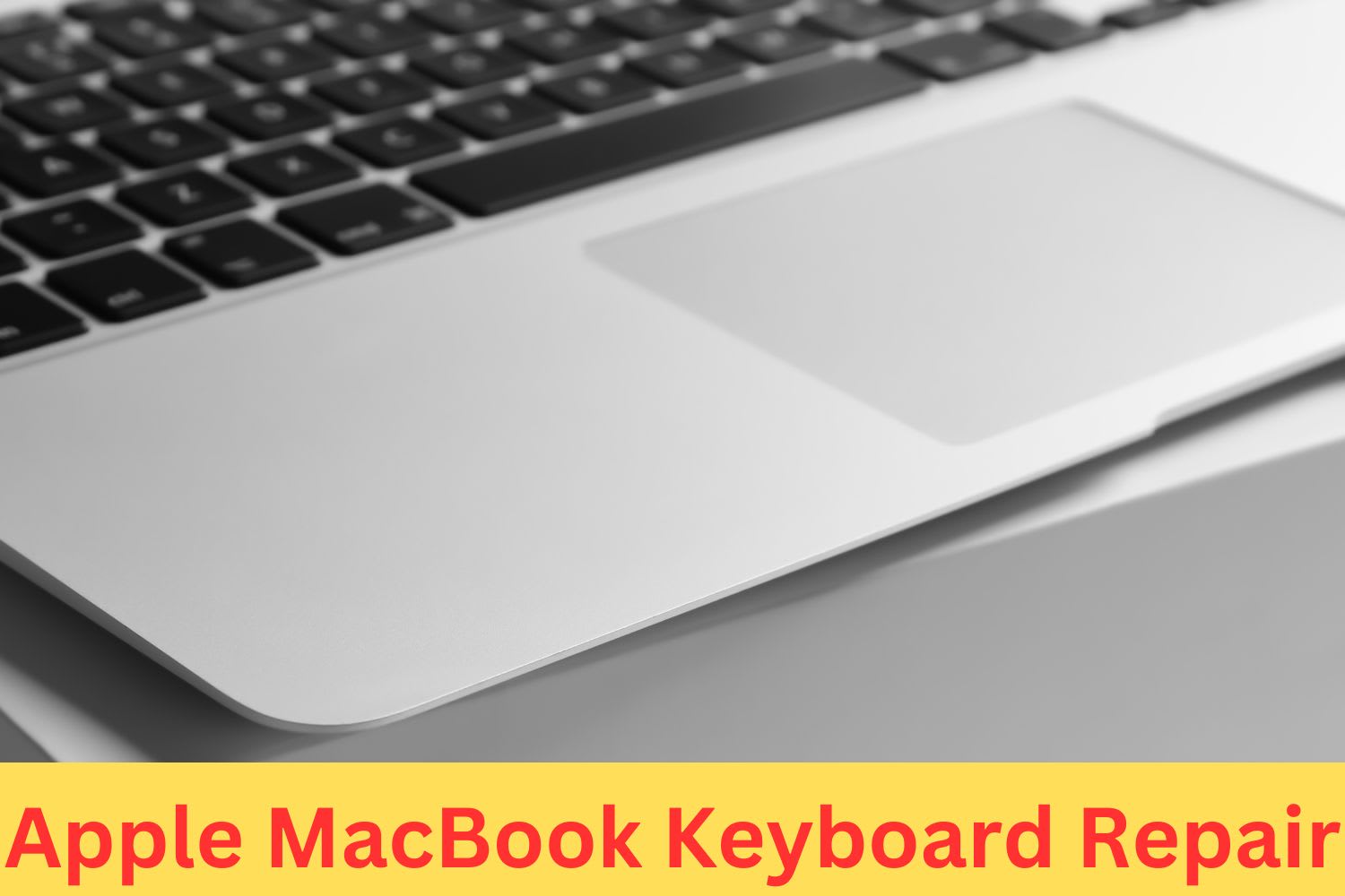 Close-up of an Apple MacBook keyboard and trackpad, representing repair or replacement service for non-working keys or input issues