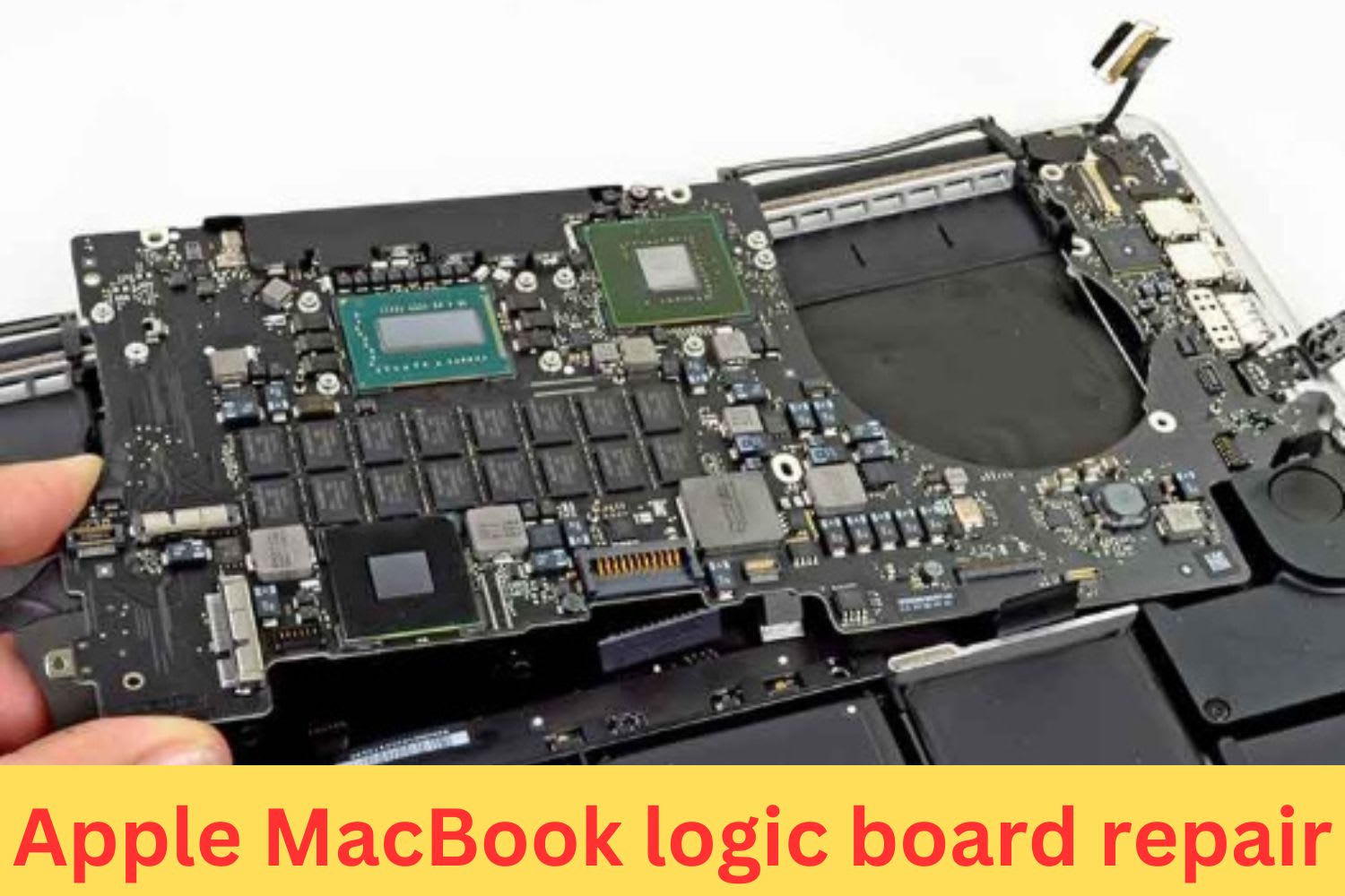 Technician holding a MacBook logic board above the opened laptop chassis during a motherboard replacement or repair process