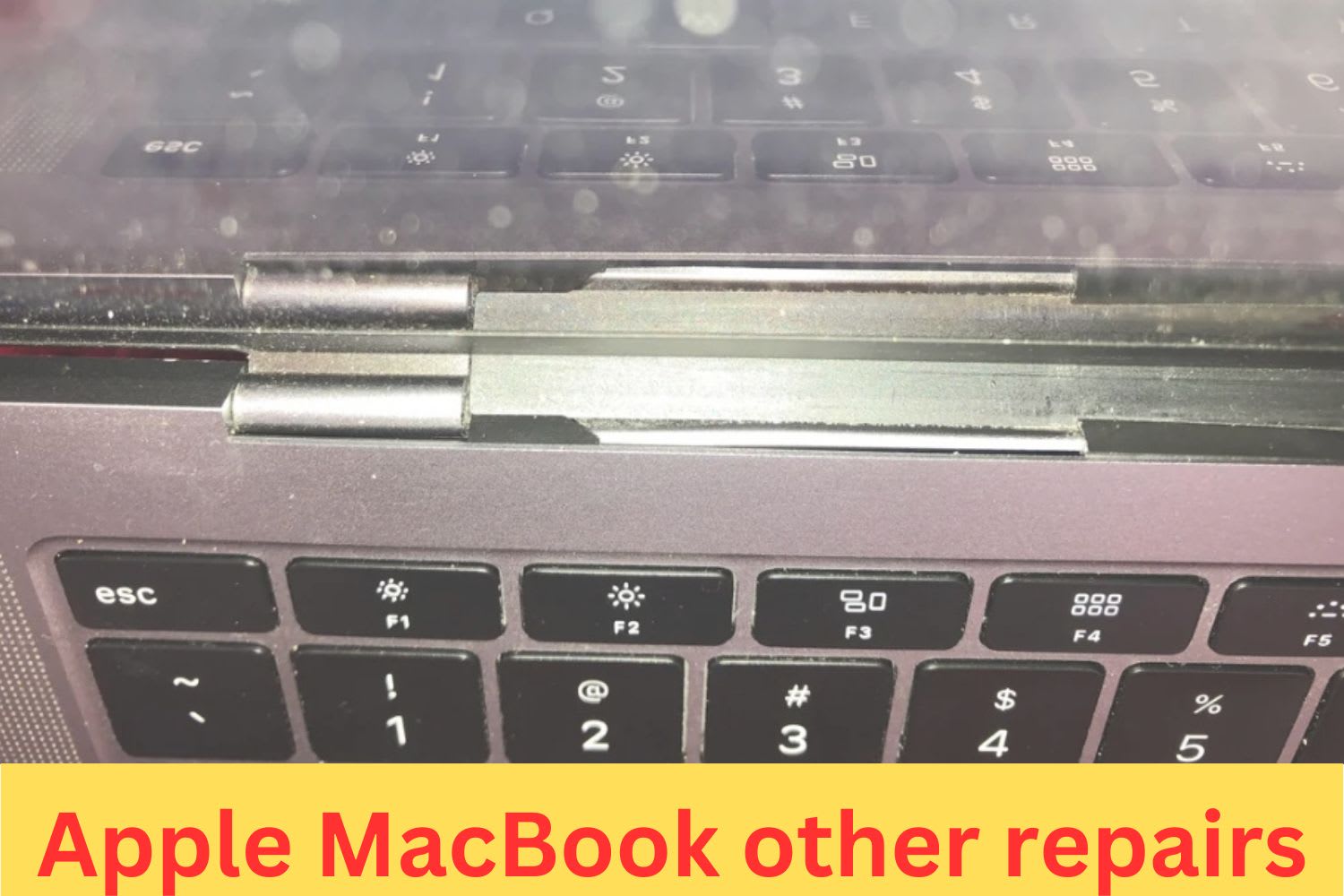Close-up of a broken or misaligned screen hinge on an Apple MacBook, indicating the need for repair