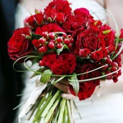 Bride holding gorgeous roses bouquet at Newport wedding