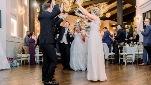 Bride and groom entering dance floor to the music of RI DJ Alex