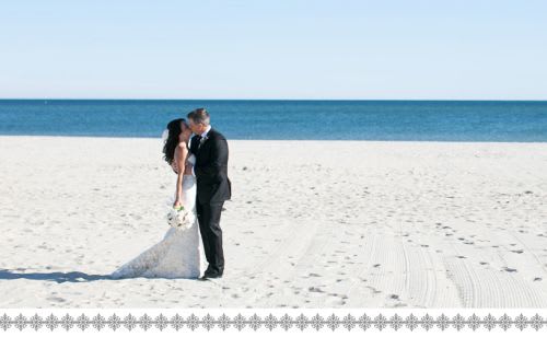 Photo of couple kissing at beach wedding in Falmouth, MA