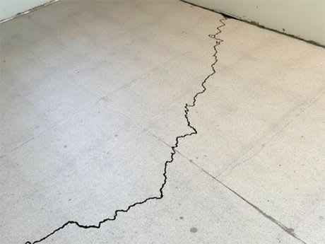 RI concrete basement with floor cracks