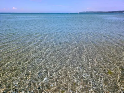 At the shore of Lake Michigan, but by way of a road that leads right to it.