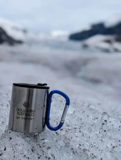 Tour provided mug for crisp, clean, and clear glacial water tasting