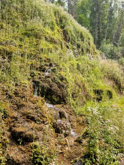 Hot spring water cascading down the hill