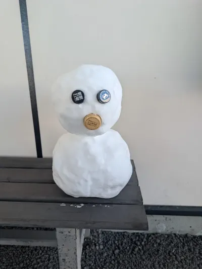 Cute little snowman created welcoming me upon my car rental return