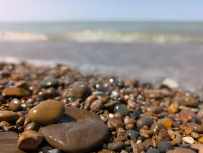 A closer shot of the rocky shore