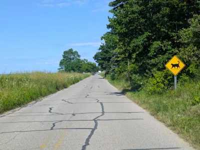 I love the sign posted on this road that passes through the Beverly Shores section of the National Park