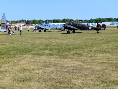 C-45 (Beech 18) taxiing in for parking in the Warbird area